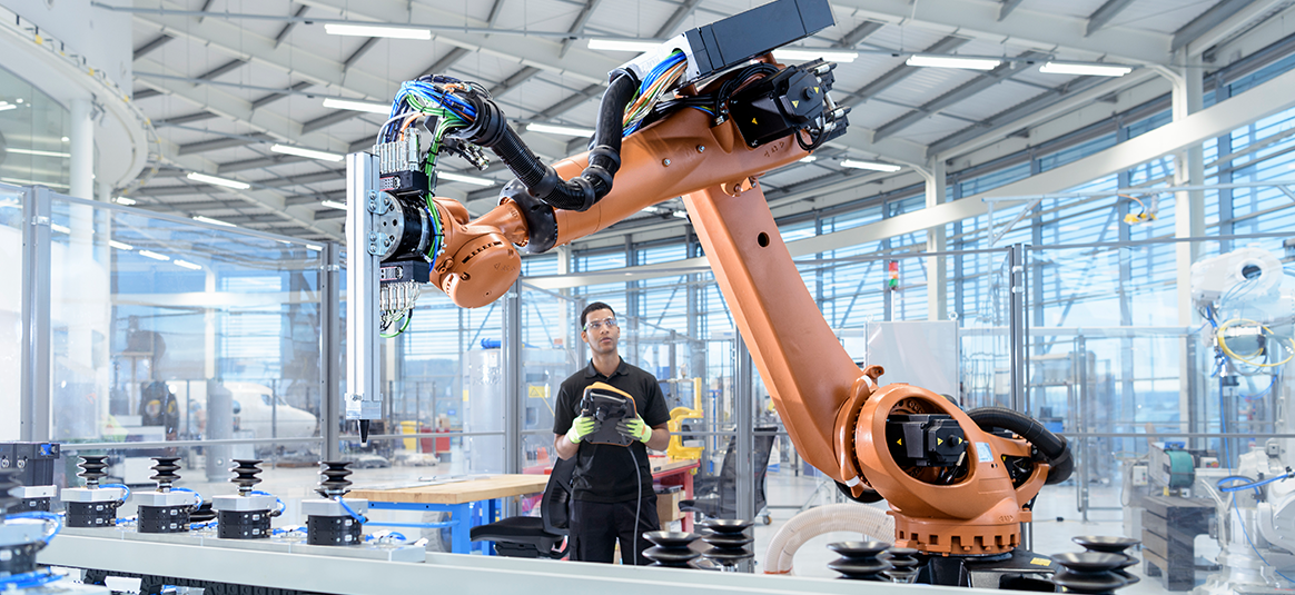 image links to article: "Manufacturing outlook: robotics and automation"